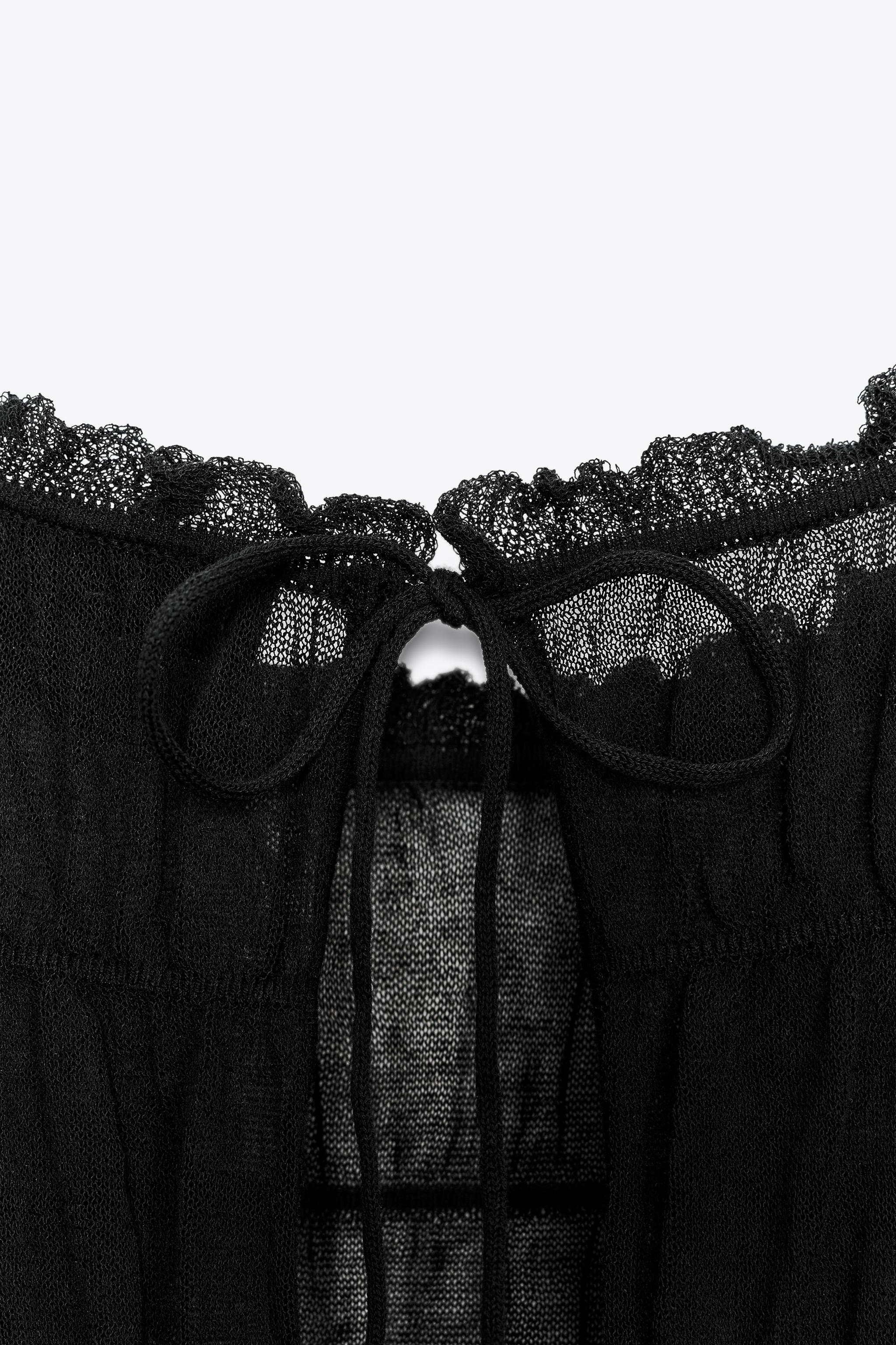 SEMI-SHEER RUCHED KNIT BLOUSE